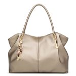 sac porté épaule doré